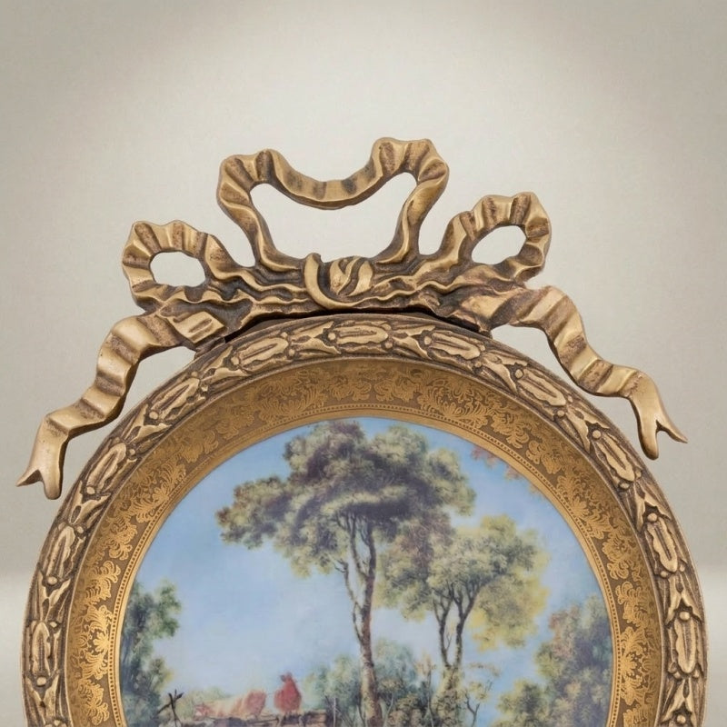 king charles circular decorative plate with bow crest and nature scene