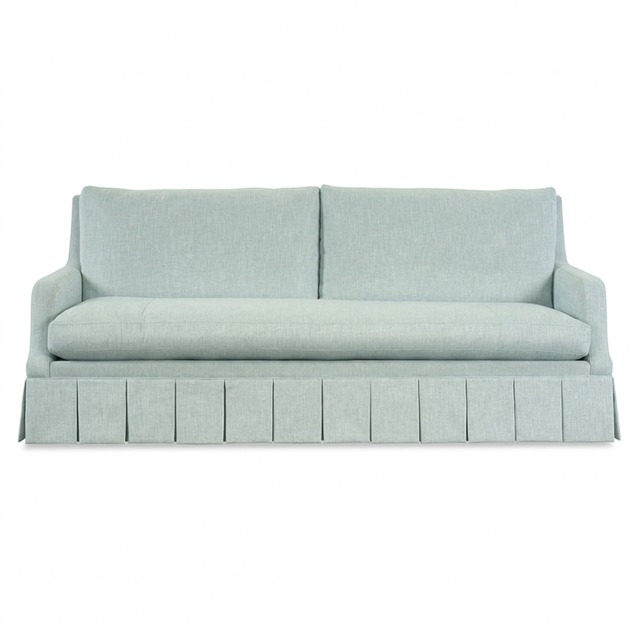 Camille skirted sofa, straight-on front view on a white background