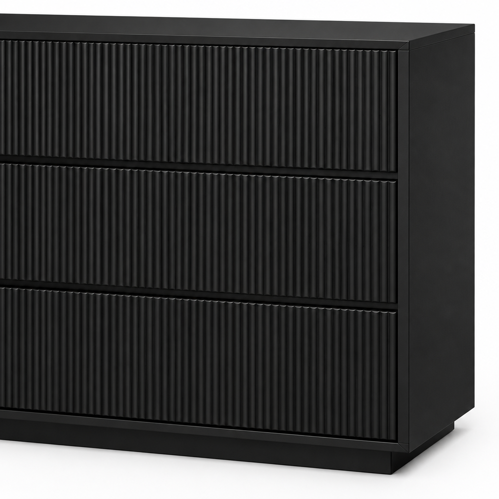 Close-up of the Isola dresser’s black vertical fluted drawer fronts