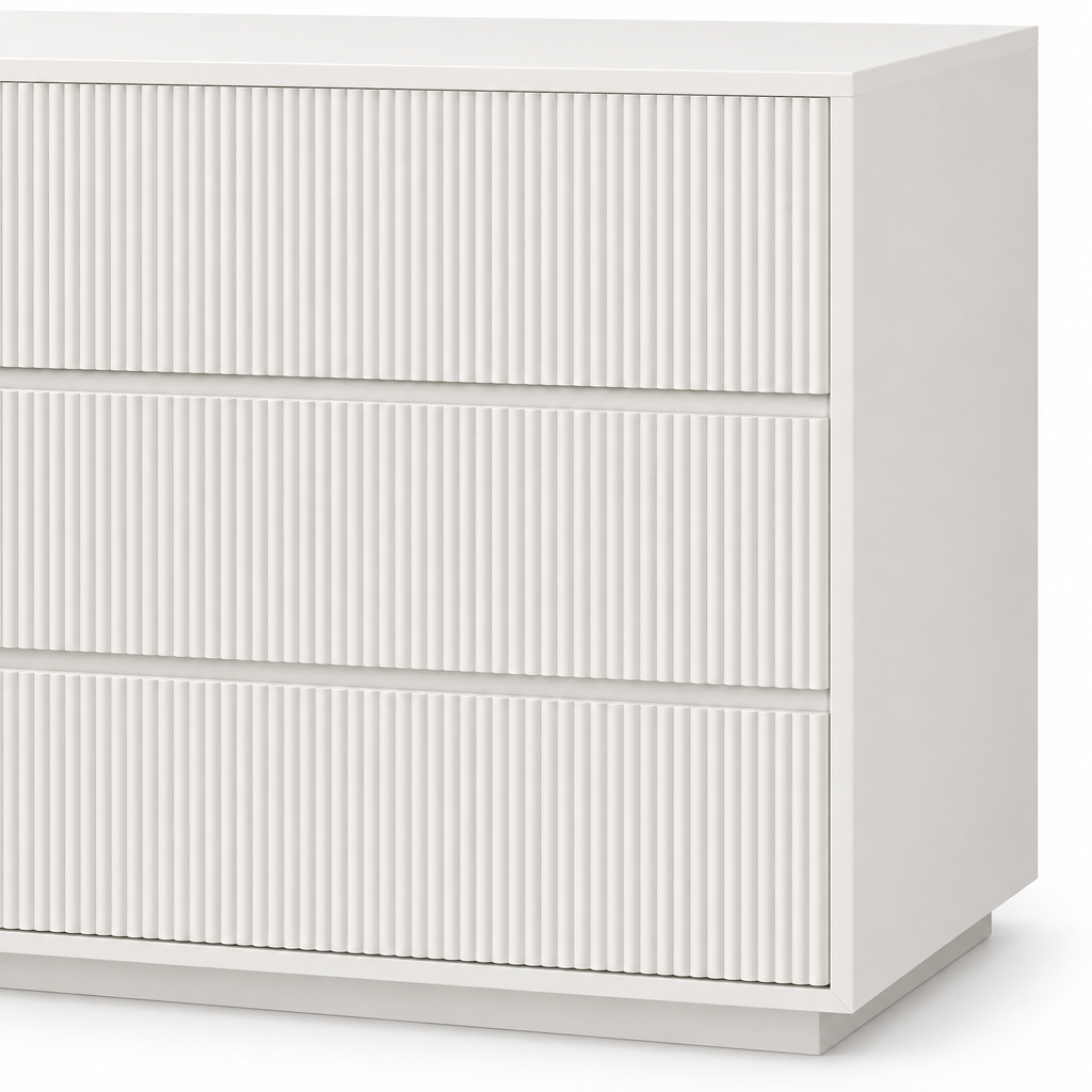 Close-up of the Isola dresser’s vertical fluted fronts and matte white finish