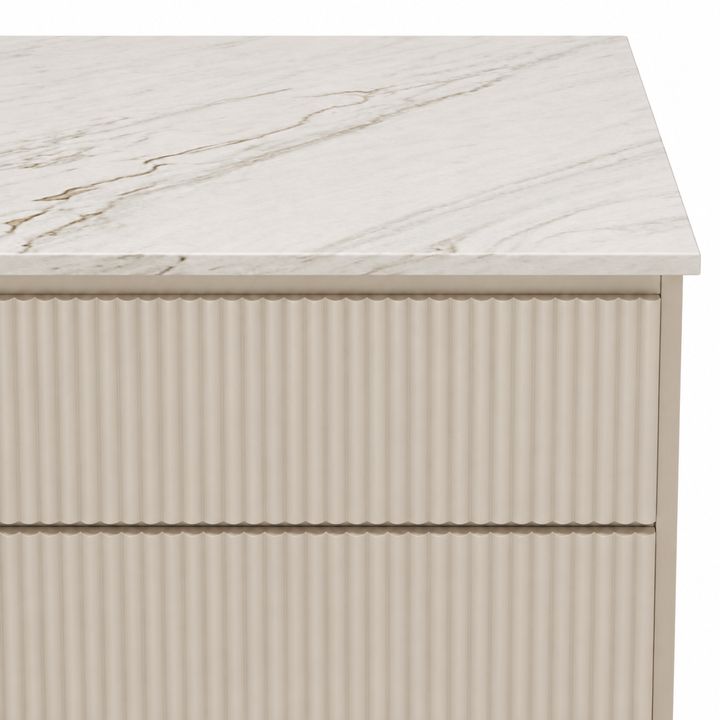 Detail of the Evelise dresser’s marble edge and fluted front