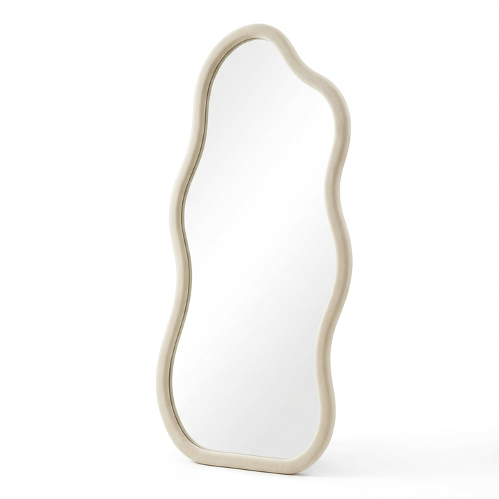 Elevated front view of the Aurelia mirror’s curved upper frame