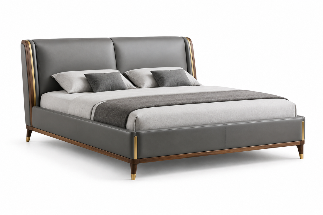 Gray leather bed with natural wood frame and golden accents on a white background