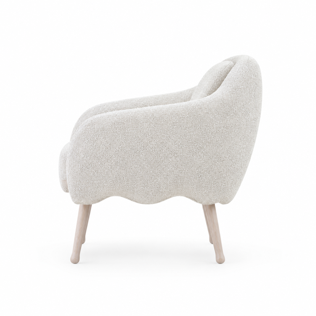 Nola white lounge armchair side view on white background