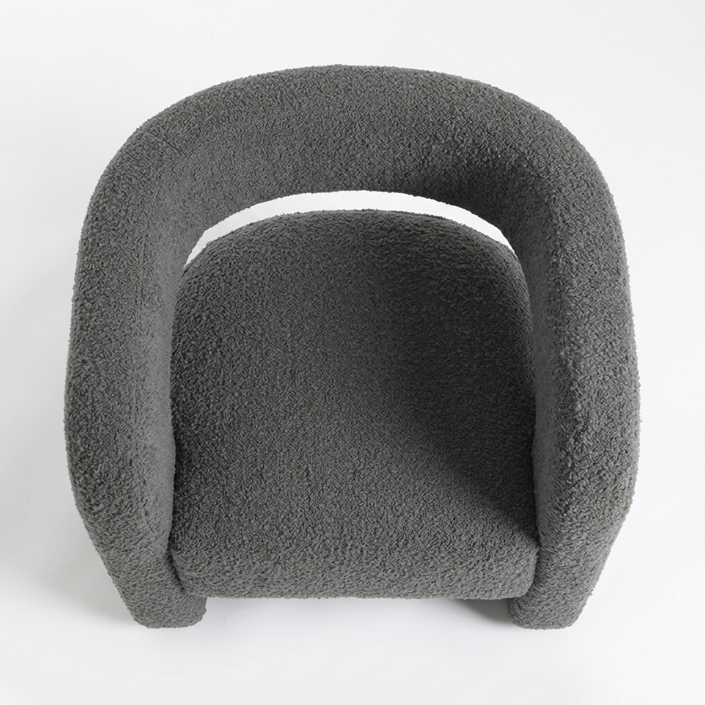 Elaris grey bouclé armchair, overhead view on white
