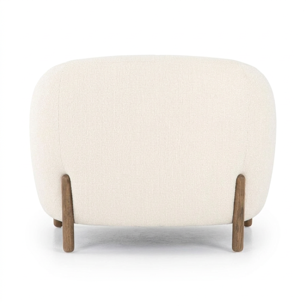 Norvelle ivory barrel armchair, rear view on white