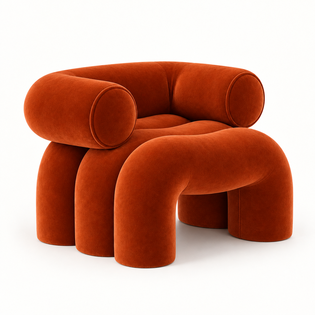 Cira sculptural armchair shown in burnt-orange velvet