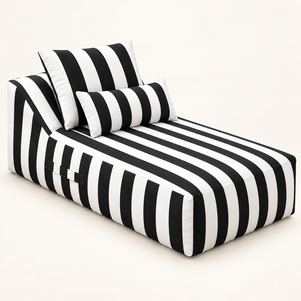 Riva outdoor chaise lounge with white-and-black striped upholstery on an off-white background