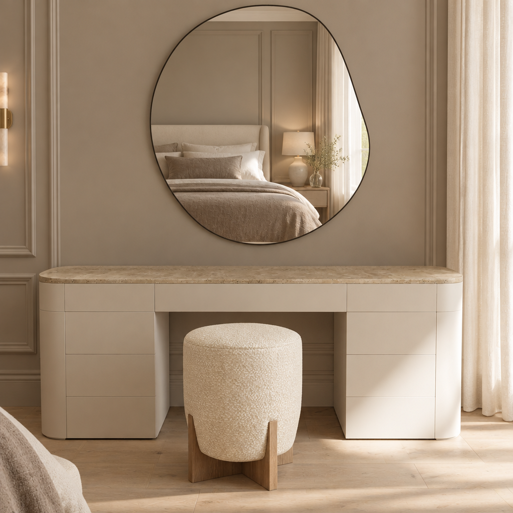 Marcella curved matte vanity with natural stone top, front bedroom view; mirror and pouf not included