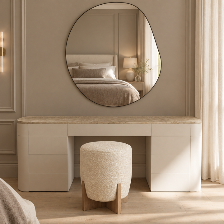 Marcella curved matte vanity with natural stone top, front bedroom view; mirror and pouf not included
