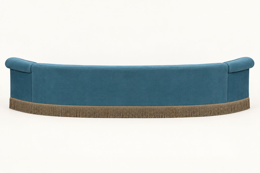 AI-inferred rear view of Sultana curved blue sofa