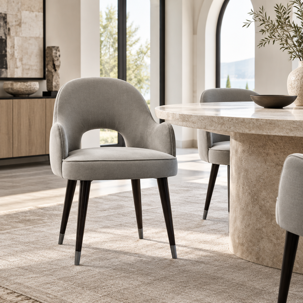 Arlo gray armchair styled in a luxury modern dining room