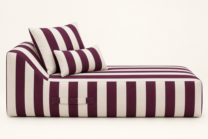 Riva outdoor chaise lounge on an off-white background, side profile