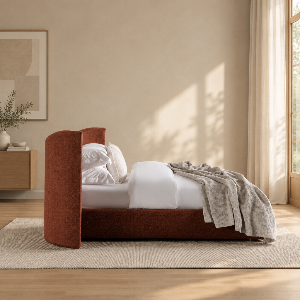 Wingback bed in a warm beige and wood interior