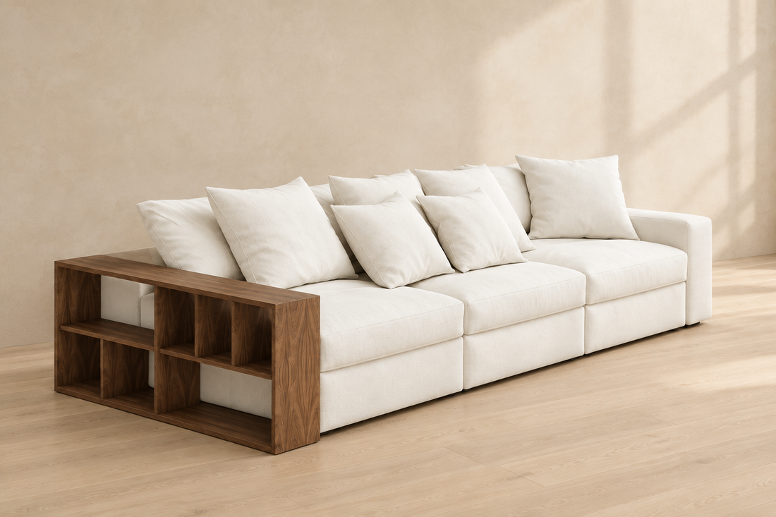 Liora white cotton-blend sofa with walnut bookcase arm in a warm neutral living room