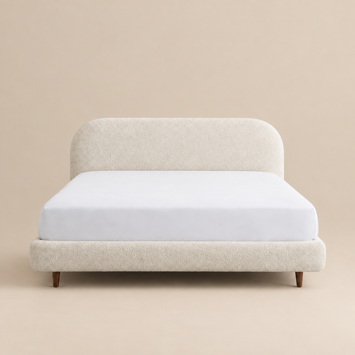 Portofino rounded upholstered bed front view