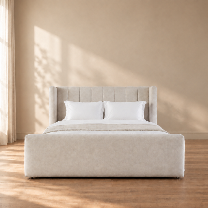 Linden bed with white pillows and sheets, no brown cushions or vases