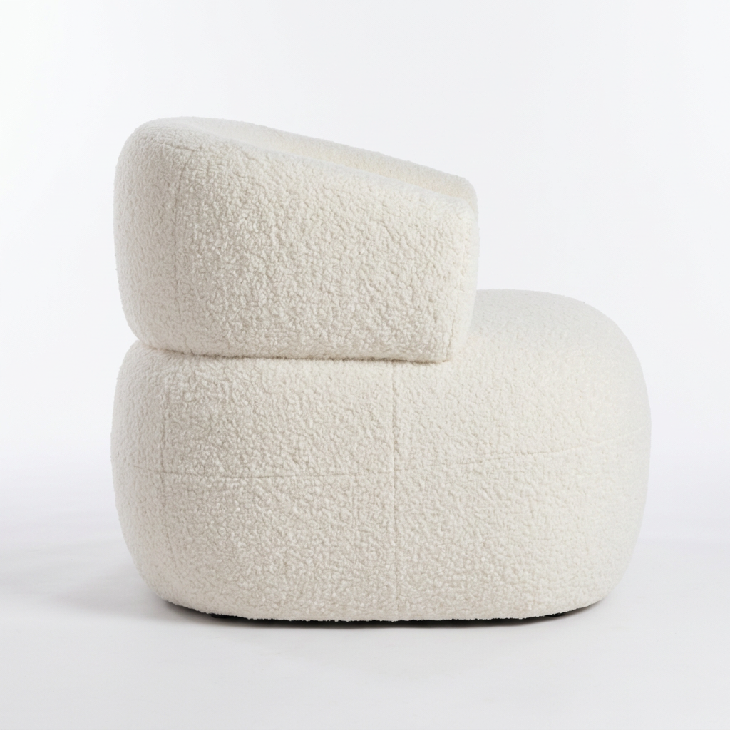 Soreva ivory bouclé armchair, left-side view on white