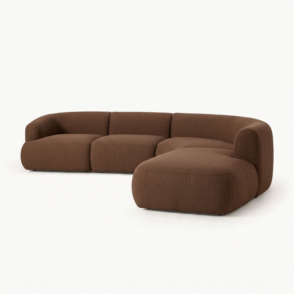 Brown fabric corner sofa with rounded arms and chaise on an off-white studio background