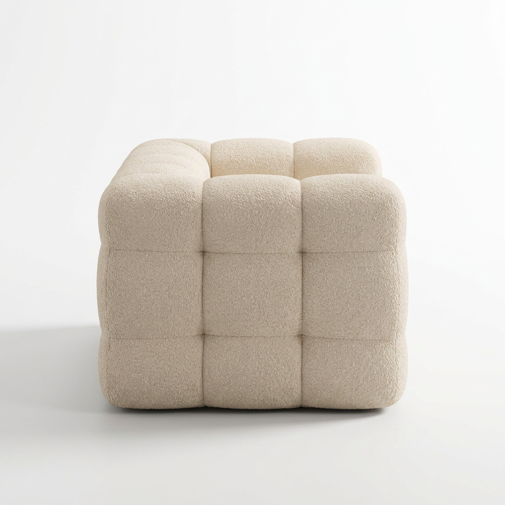 Osvira tufted beige bouclé armchair, right-side view on white
