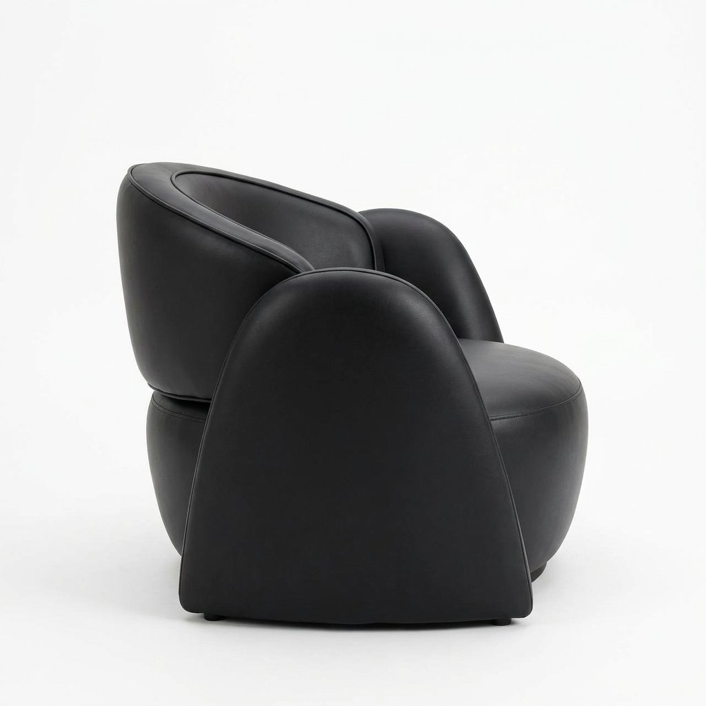 Varenne black faux leather armchair, left-side view on white