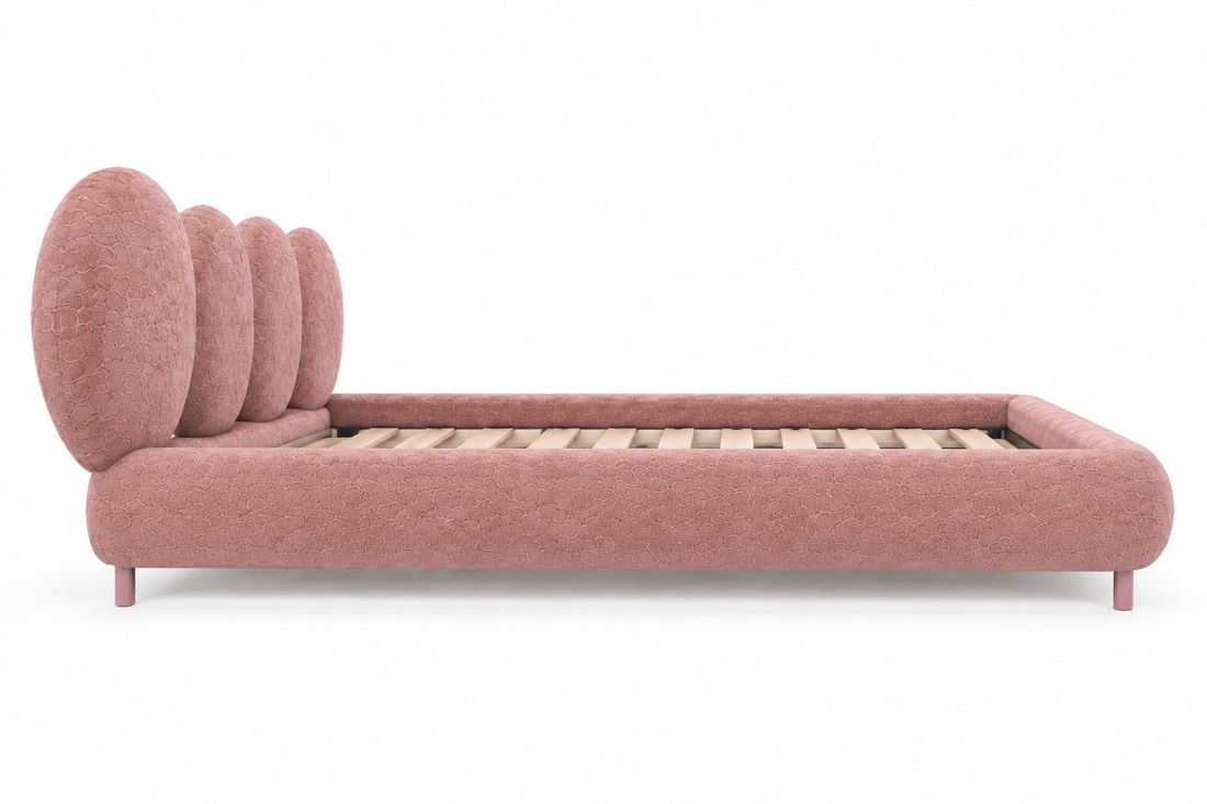 Mira Petal Bed pink upholstered frame side view on white background