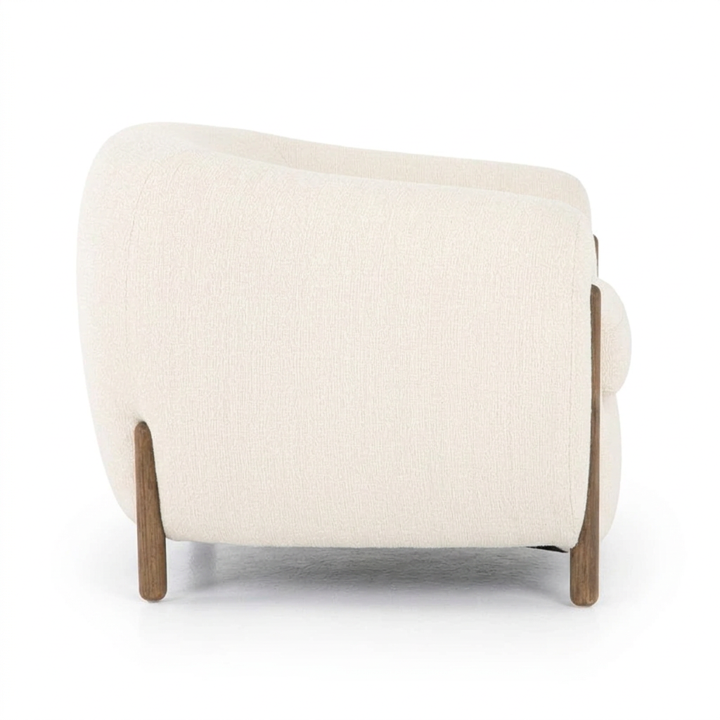 Norvelle ivory barrel armchair, right-side view on white