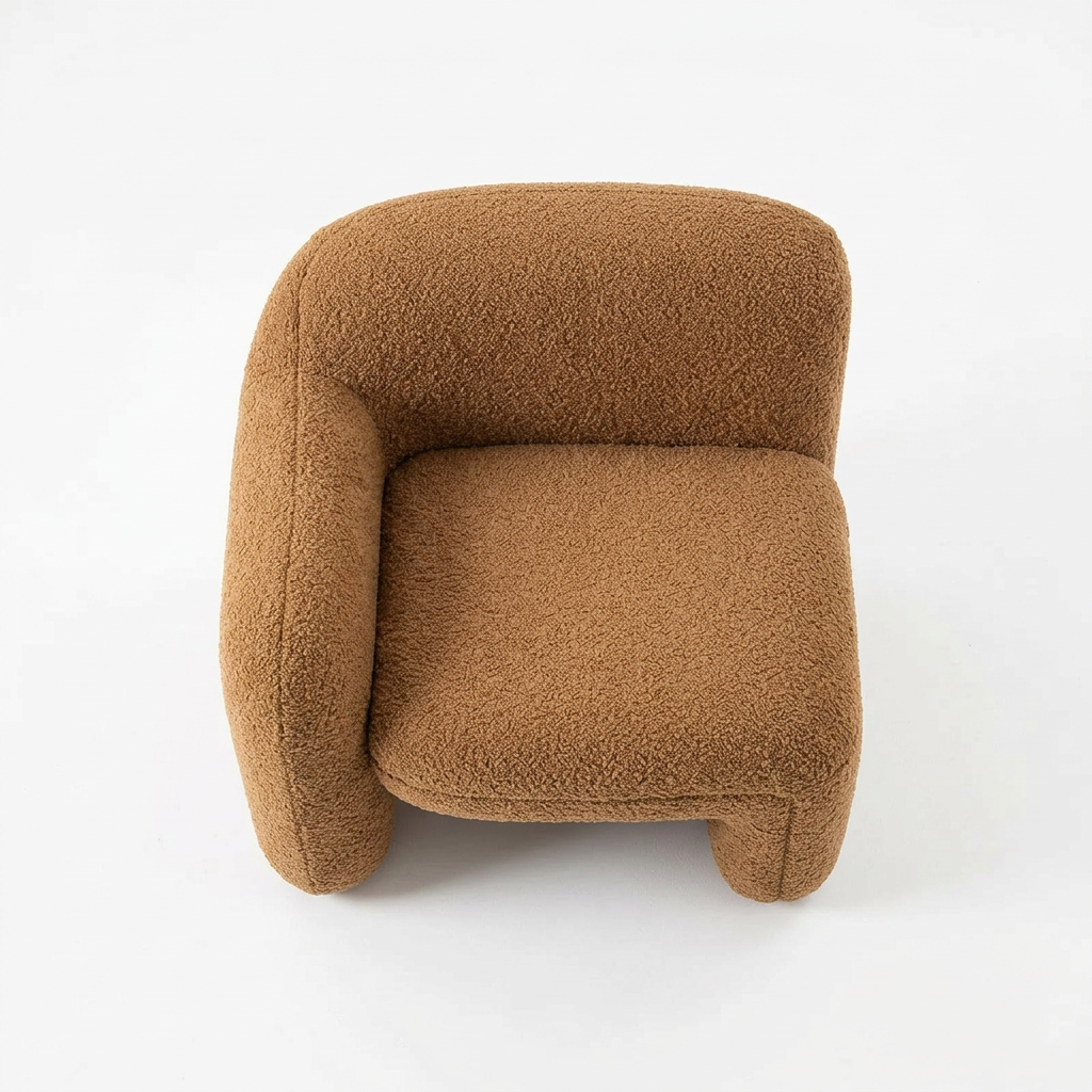 AI-reconstructed overhead view of Tovelle asymmetric bouclé accent chair on white