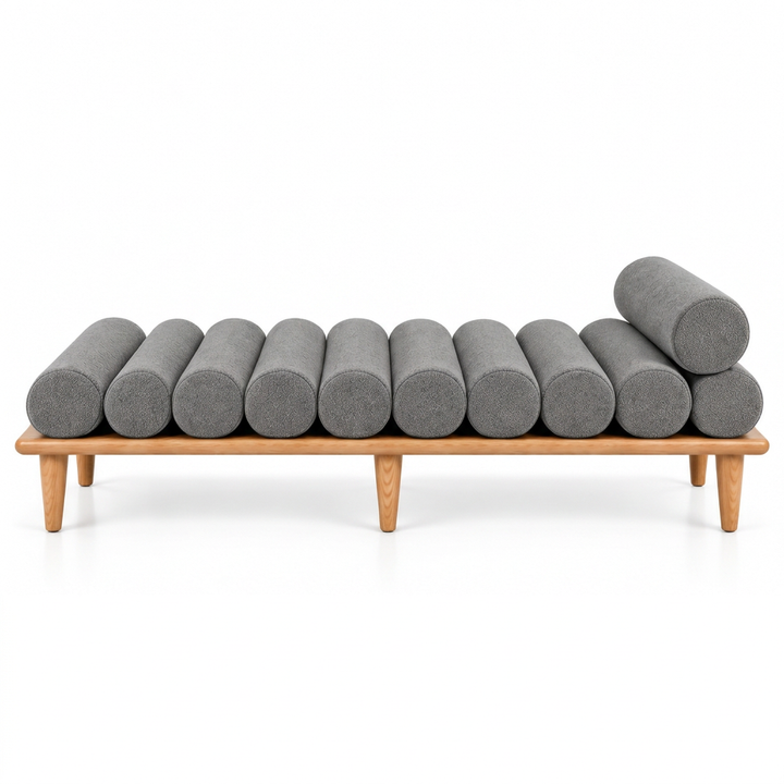 Lana bench with cylindrical cushions, front view on a white background